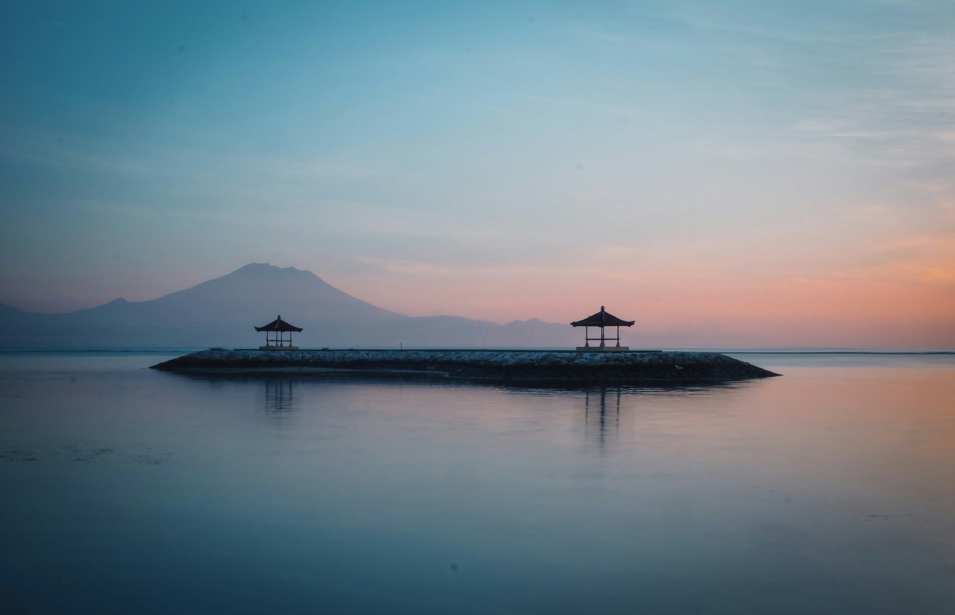 Sunrise over the sea and mountains at Sanur, Bali